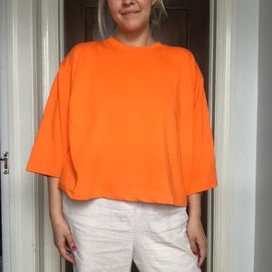bright cropped sleeve blouse